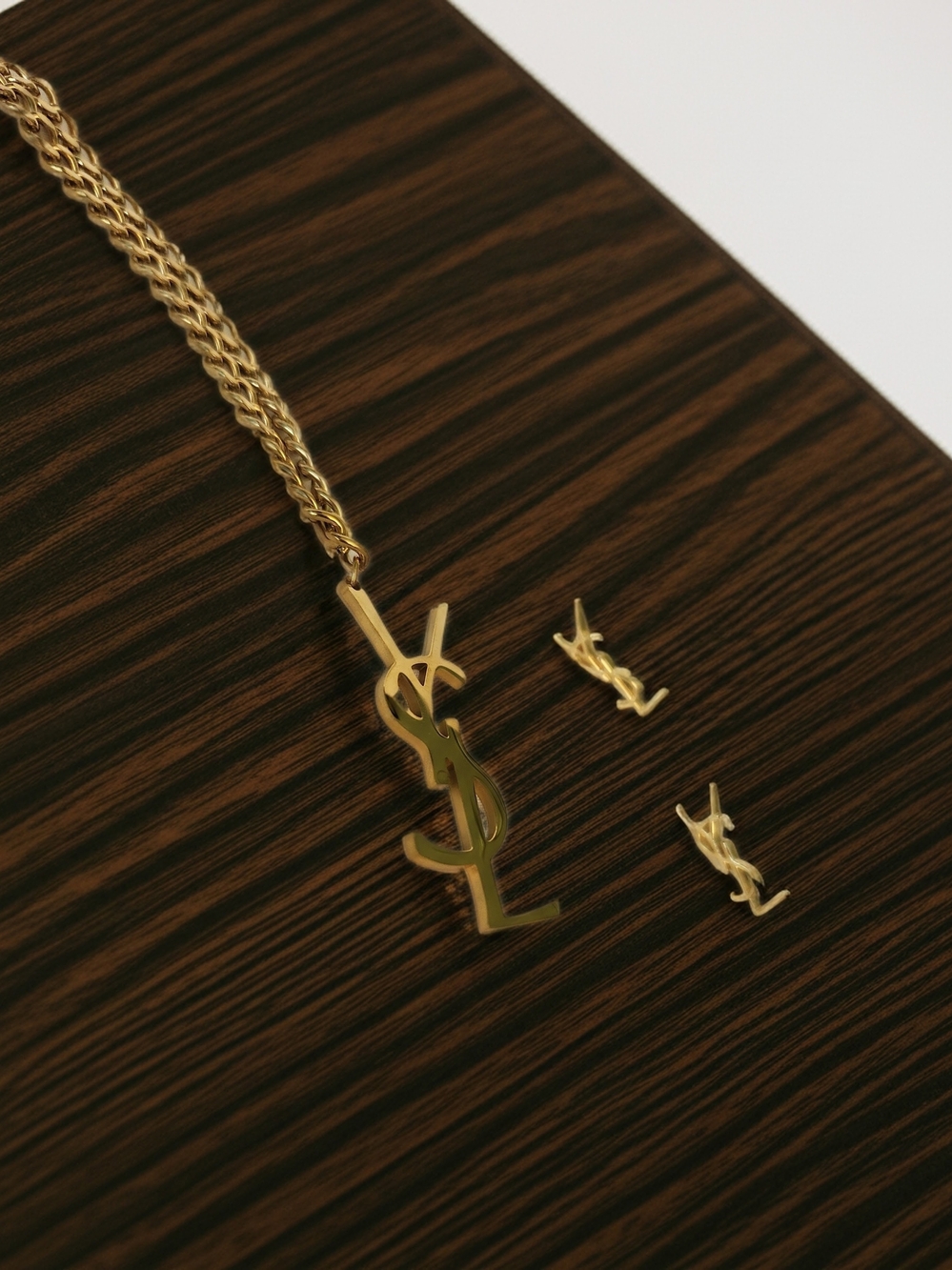 Yves Saint Laurent Gold YSL Pendant Necklace and Earrings Set